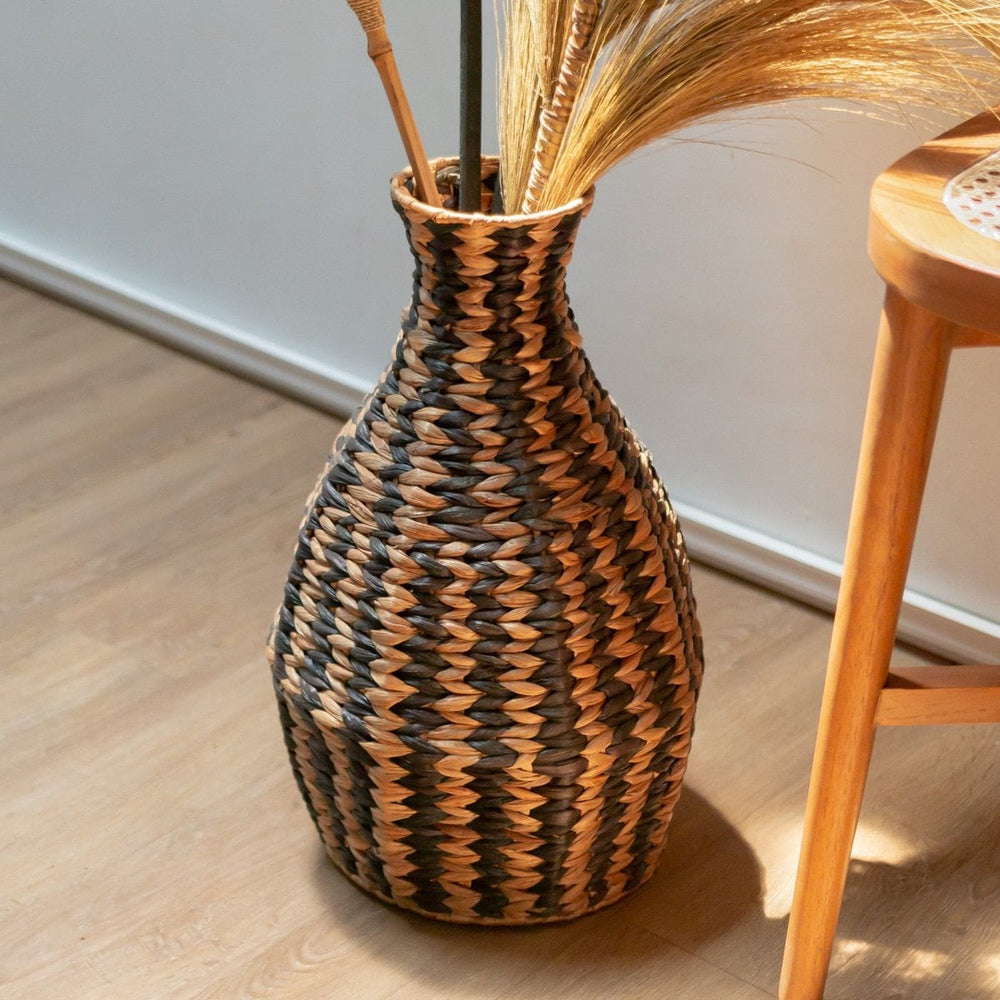 Black and natural woven water hyacinth vase
