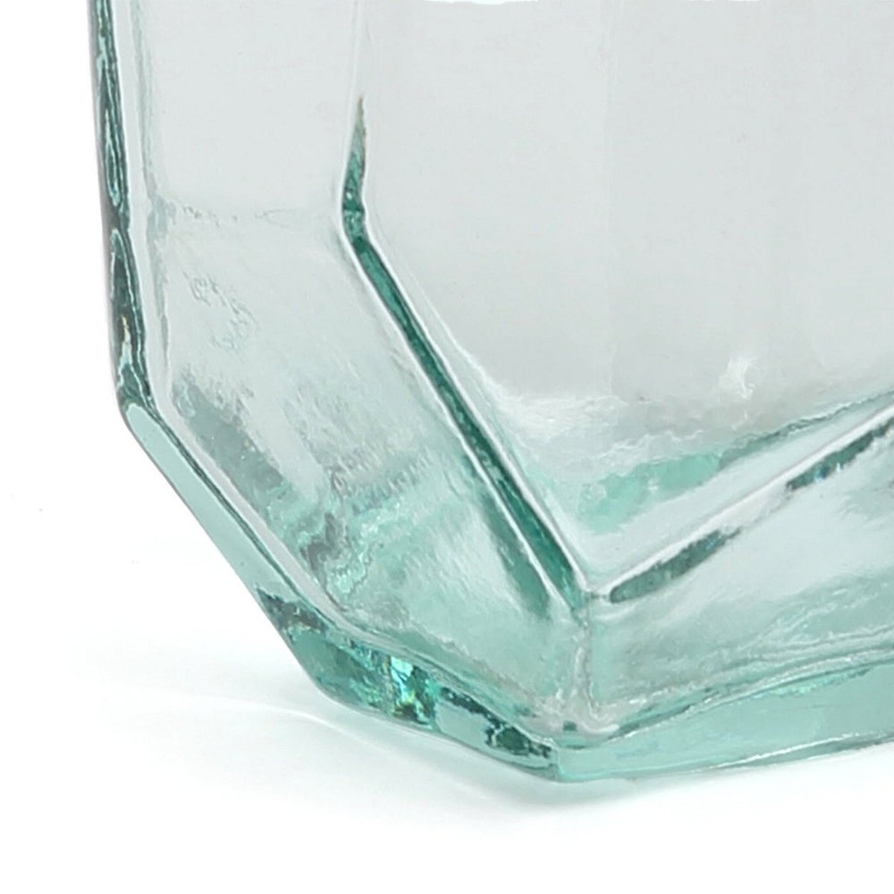 Hexagonal glass vase on a white background