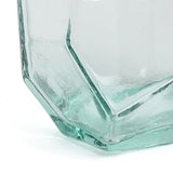 Hexagonal glass vase on a white background