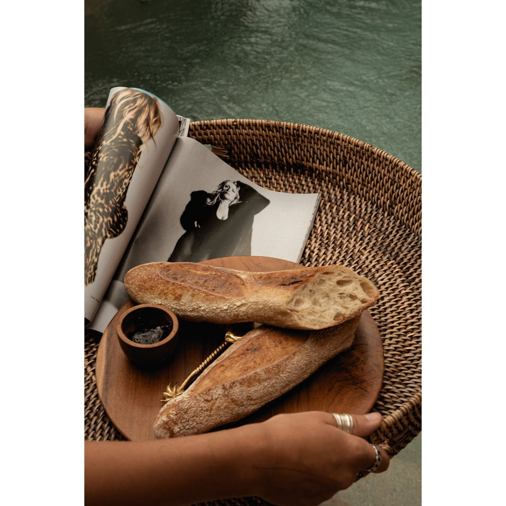 Natural brown woven rattan serving tray with cut-out handles