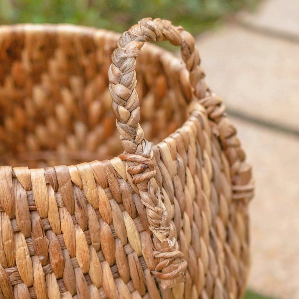 Beige and brown woven water hyacinth basket with zig zag pattern