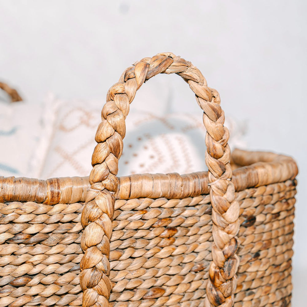 Beige woven water hyacinth laundry basket
