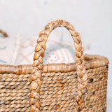 Beige woven water hyacinth laundry basket