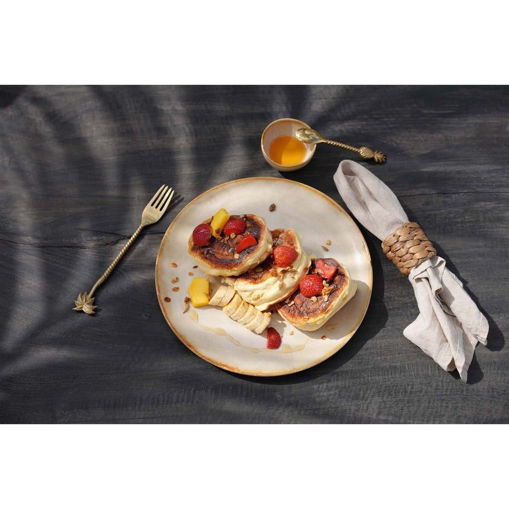White stoneware dinner plate with burnt-umber rim