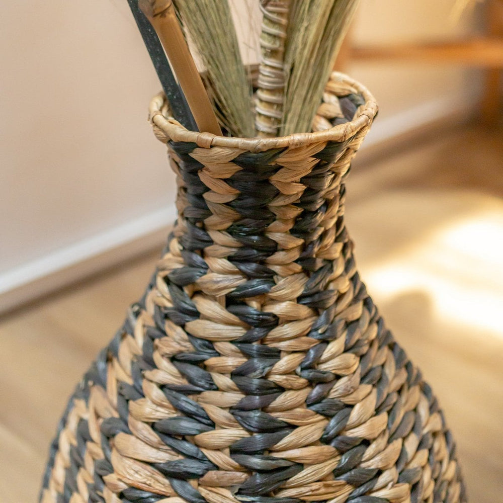 Black and natural woven water hyacinth vase
