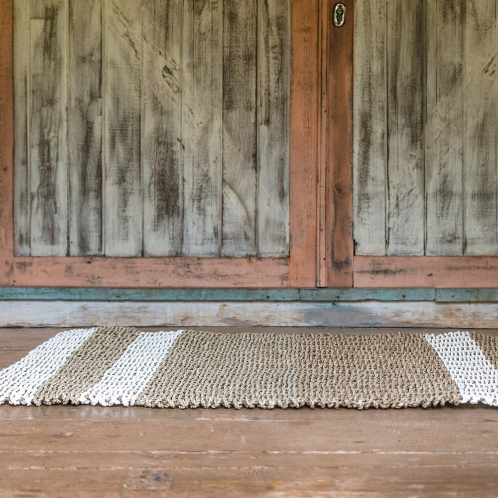Beige and white striped seagrass rug