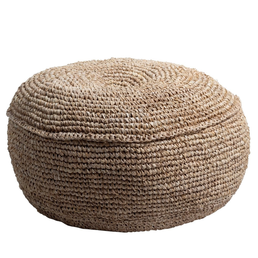Round woven ottoman with a lid on a white background