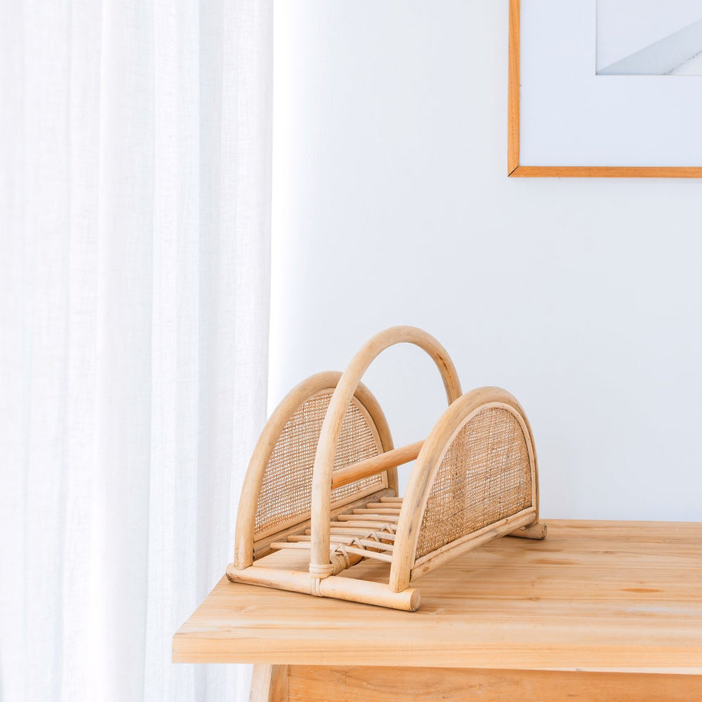 Beige woven rattan newspaper rack with handle